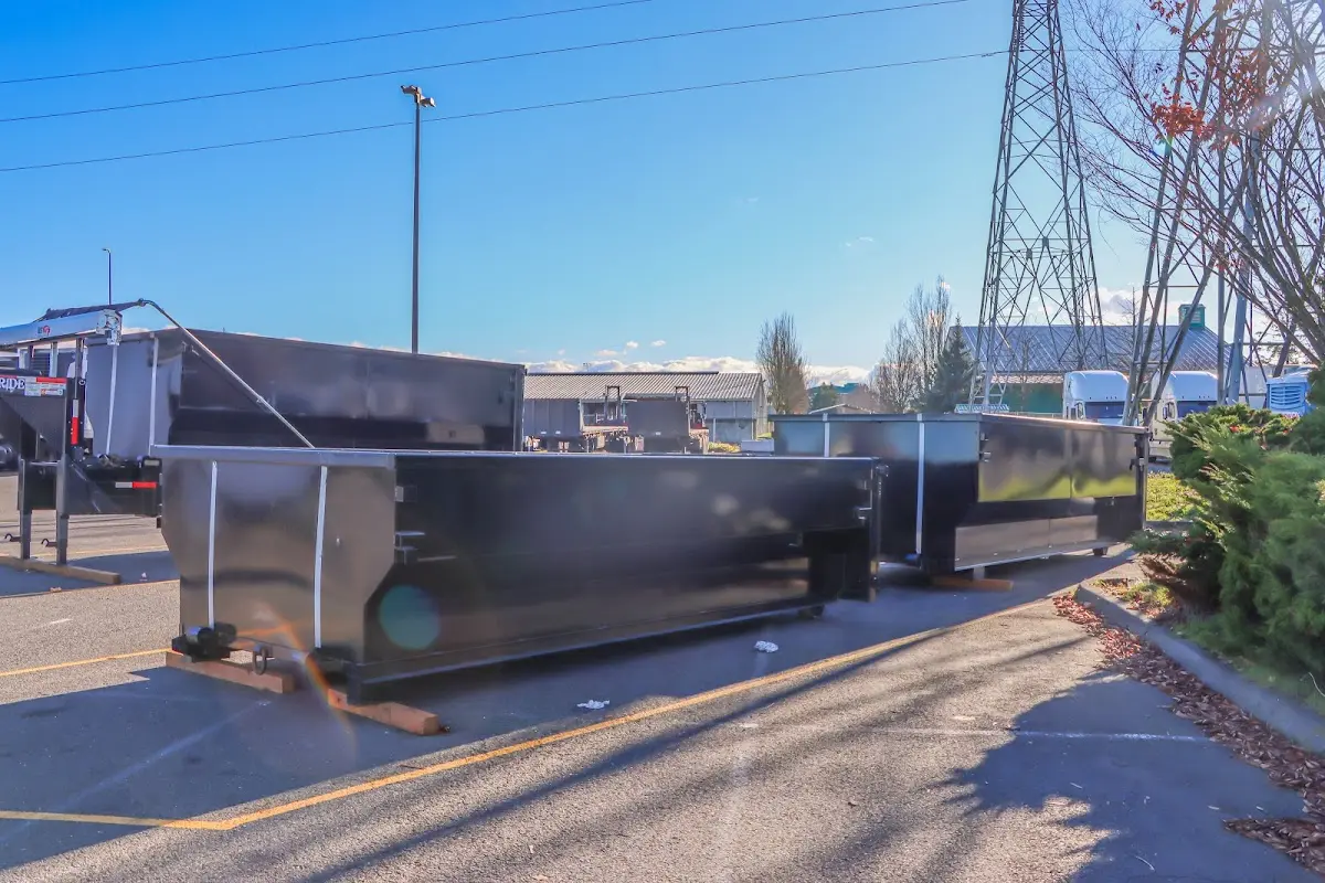 Roll-off dumpster ready for waste disposal at job site for 2 Yard Dumpster Rental in Gary